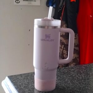 Purple Stanley cup with bottom cover